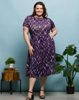 24seven Comfort Apparel Plus Size Purple Print Short Sleeve Pleated Flare Midi Pocket Dress
