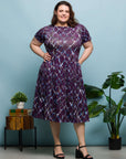 24seven Comfort Apparel Plus Size Purple Print Short Sleeve Pleated Flare Midi Pocket Dress
