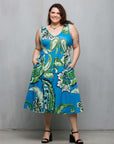 24seven Comfort Apparel Plus Size Midi Length Teal Paisley Print Sleeveless Pleated Pocket Dress