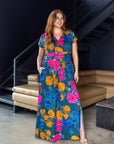 24seven Comfort Apparel Plus Size Floral Print Cap Sleeve V Neck Side Slit Pocket Maxi Dress