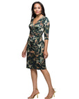 24seven Comfort Apparel Three Quarter Sleeve Faux Wrap Dress in Green Animal Print