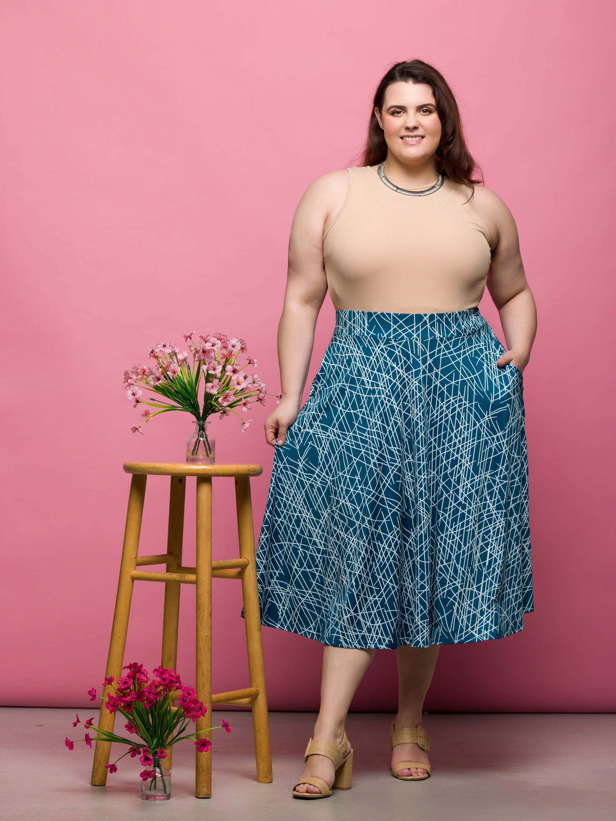 24seven Comfort Apparel Plus Size Teal Geometric Print Elastic Waist Pocket Midi Skirt