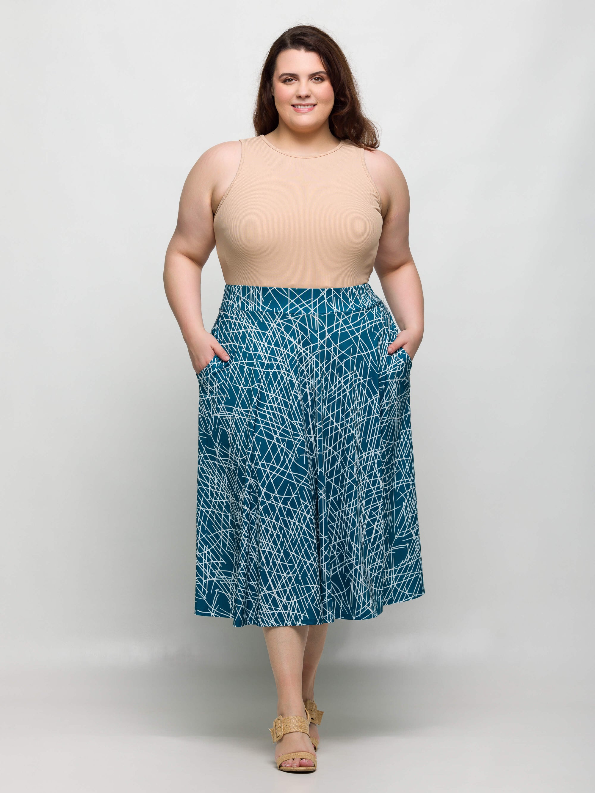 24seven Comfort Apparel Plus Size Teal Geometric Print Elastic Waist Pocket Midi Skirt