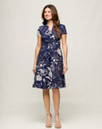 24seven Comfort Apparel Womens Navy Print Short Sleeve Knee Length V Neck Wrap Dress
