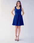 Sleeveless Pleated Skater Dress with Pockets